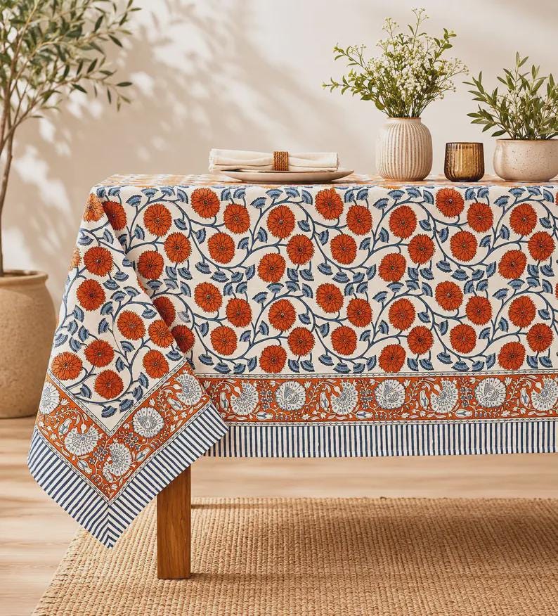 Nappe ronde en coton imprimé orange brûlé - motif floral